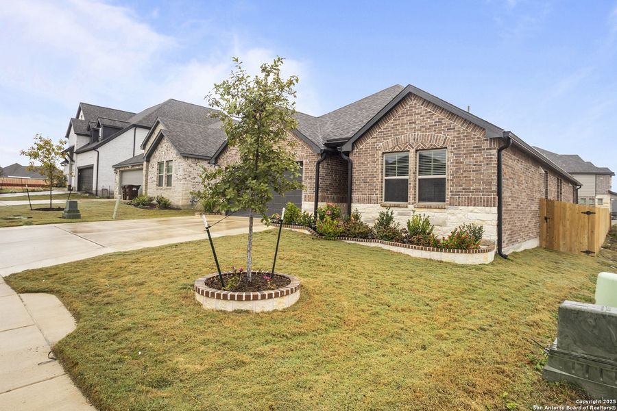 Front exterior of a new home in , San Antonio, TX, highlighting curb appeal (Image 22). Front exterior of a new home in , San Antonio, TX, highlighting curb appeal (Image 22).