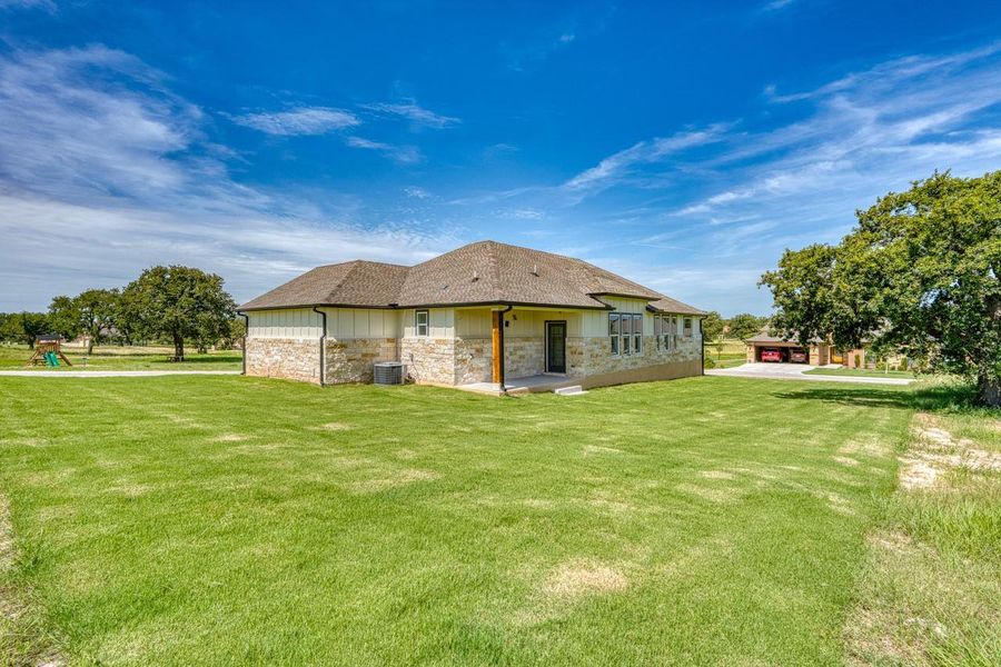 Exterior details and patio area of a home in , Kingsland (Image 3).