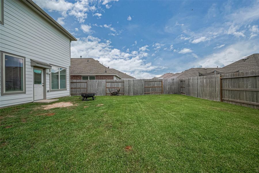 Exterior details and patio area of a home in Tavola: Gulf Coast Collection, New Caney (Image 4). Exterior details and patio area of a home in Tavola: Gulf Coast Collection, New Caney (Image 4).