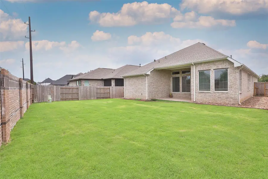 Check out this backyard oasis! With no back neighbors, you’ll enjoy added privacy, plus a large covered rear patio complete with a gas line hookup and TV connection—perfect for entertaining or relaxing outdoors. Check out this backyard oasis! With no back neighbors, you’ll enjoy added privacy, plus a large covered rear patio complete with a gas line hookup and TV connection—perfect for entertaining or relaxing outdoors.