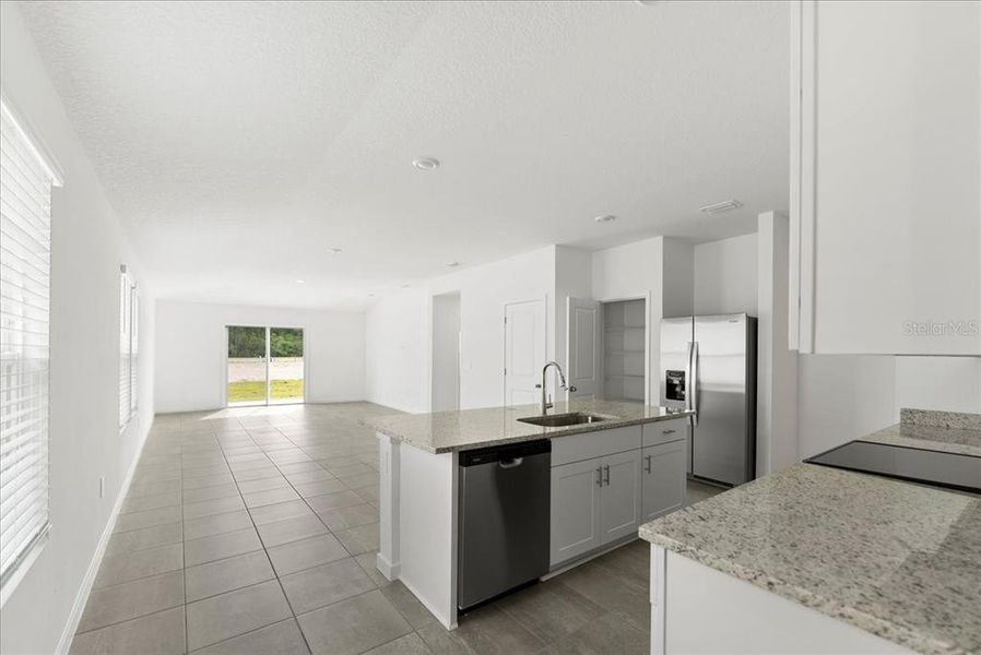 Furnished interior view inside a new home in Flagler Village - Classic Series, Palm Coast (Image 5). Furnished interior view inside a new home in Flagler Village - Classic Series, Palm Coast (Image 5).