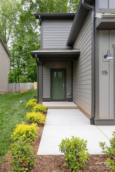 Front exterior of a new home in , Arden, NC, highlighting curb appeal (Image 29). Front exterior of a new home in , Arden, NC, highlighting curb appeal (Image 29).