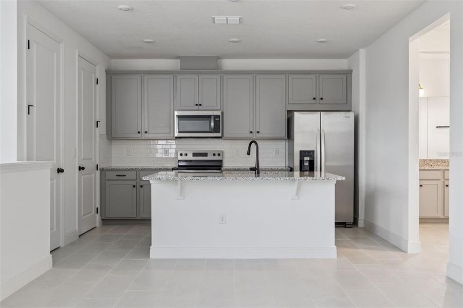 Furnished interior view inside a new home in Laureate Park (Craft Homes), Orlando (Image 11).