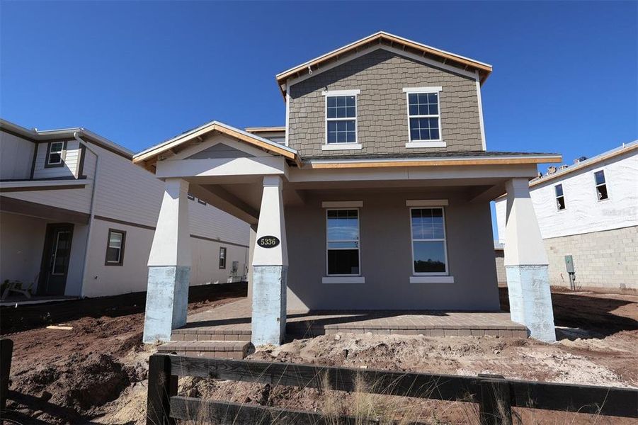 In-progress construction of a new home in Center Lake on the Park, St. Cloud, FL (Image 14).