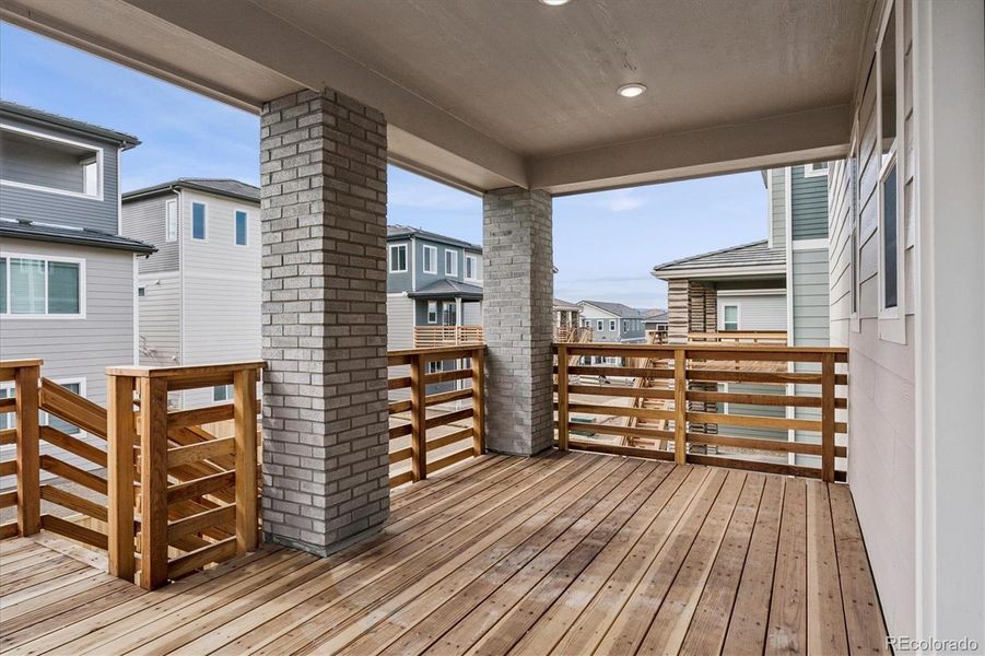 Exterior details and patio area of a home in The Summit at Meridian, Englewood (Image 3).