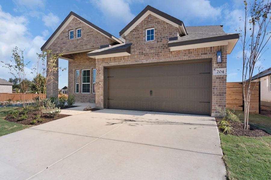 Front exterior of a new home in Highland Village, Georgetown, TX, highlighting curb appeal (Image 19).