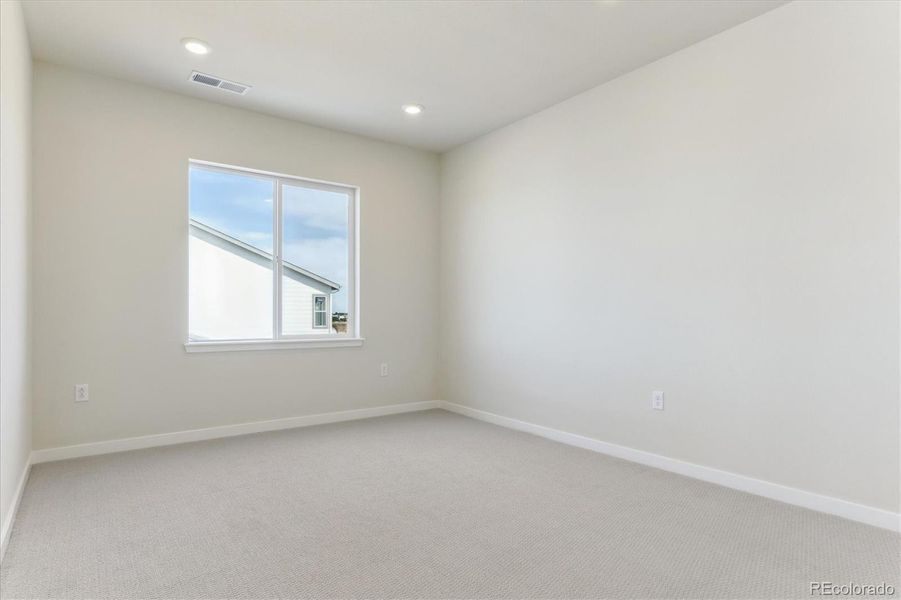 Spacious, unfurnished interior of a new home in Trails at Smoky Hill, Parker (Image 19).