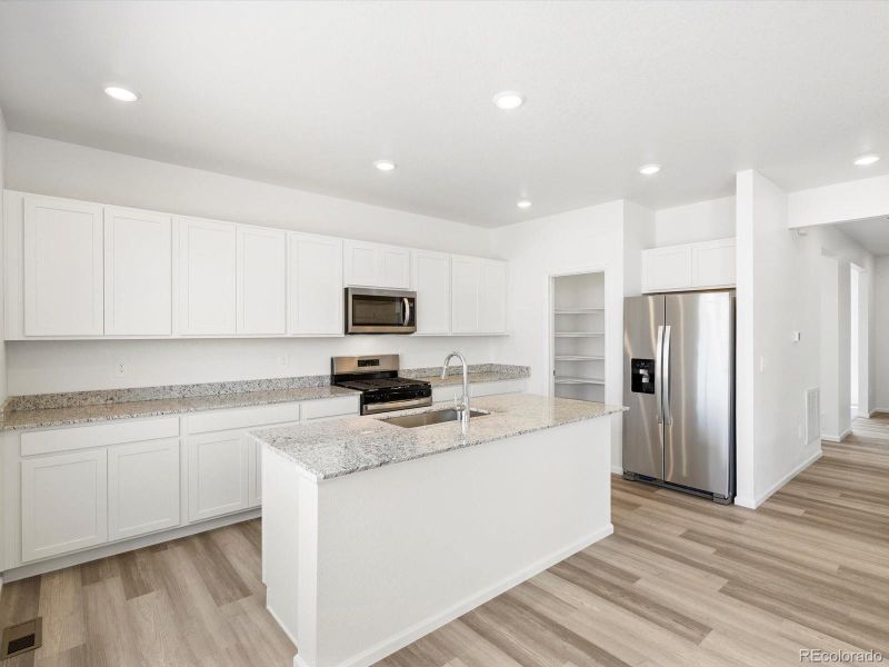 Furnished interior view inside a new home in Revere at Johnstown, Johnstown (Image 11).