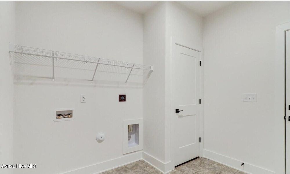 Spacious, unfurnished interior of a new home in Wood Creek, Leland (Image 8). Spacious, unfurnished interior of a new home in Wood Creek, Leland (Image 8).