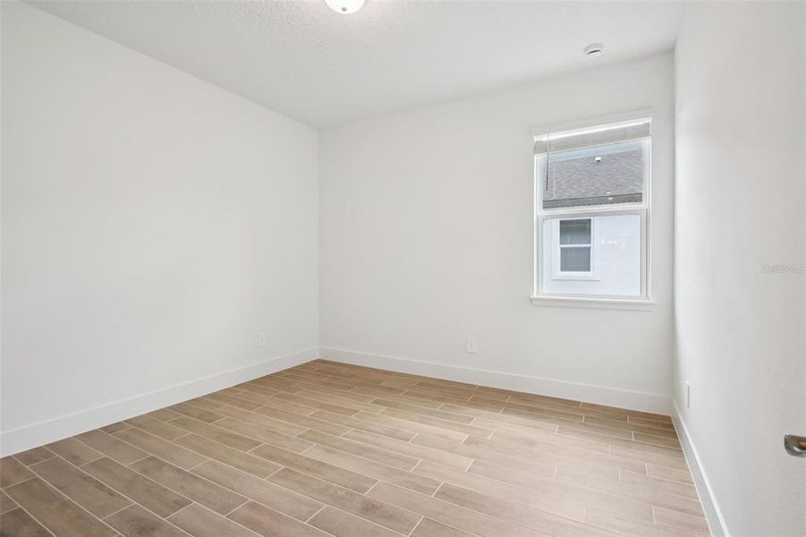 Spacious, unfurnished interior of a new home in Ridgehaven - Reserve Series, Ormond Beach (Image 31).