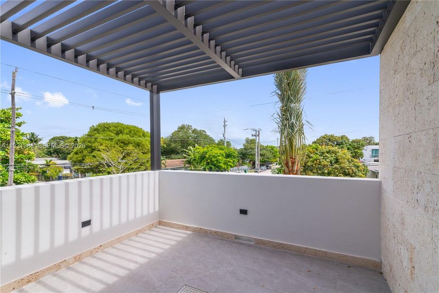 Exterior details and patio area of a home in , Miami (Image 3).