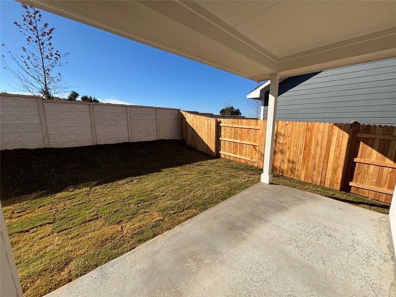 Exterior details and patio area of a home in Cannon Ranch 40s, Dripping Springs (Image 4).