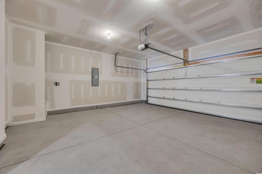 Bathroom featuring a bath, a stall shower, wood finished floors, and recessed lighting