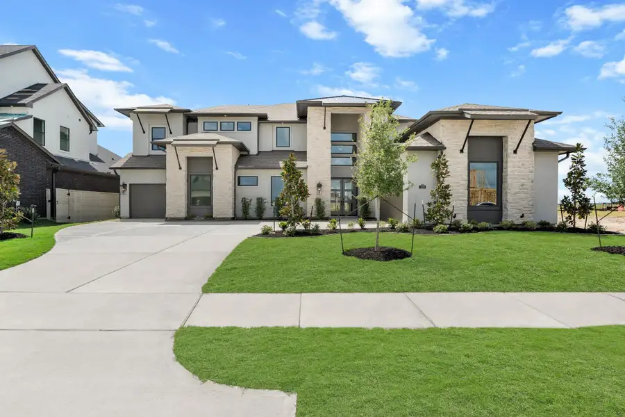 Front exterior of a new home in Legacy, League City, TX, highlighting curb appeal (Image 2).