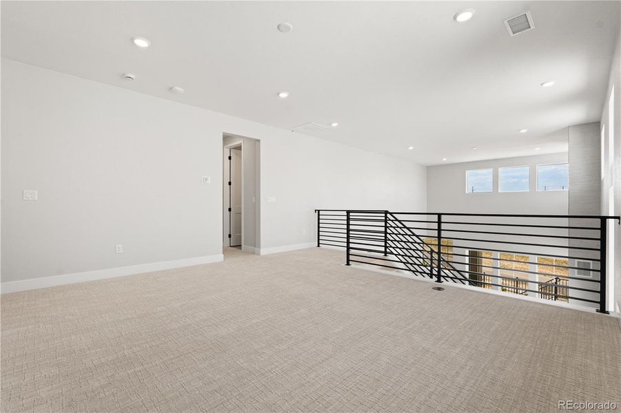 Spacious, unfurnished interior of a new home in Gallery at The Canyons, Castle Pines (Image 25).