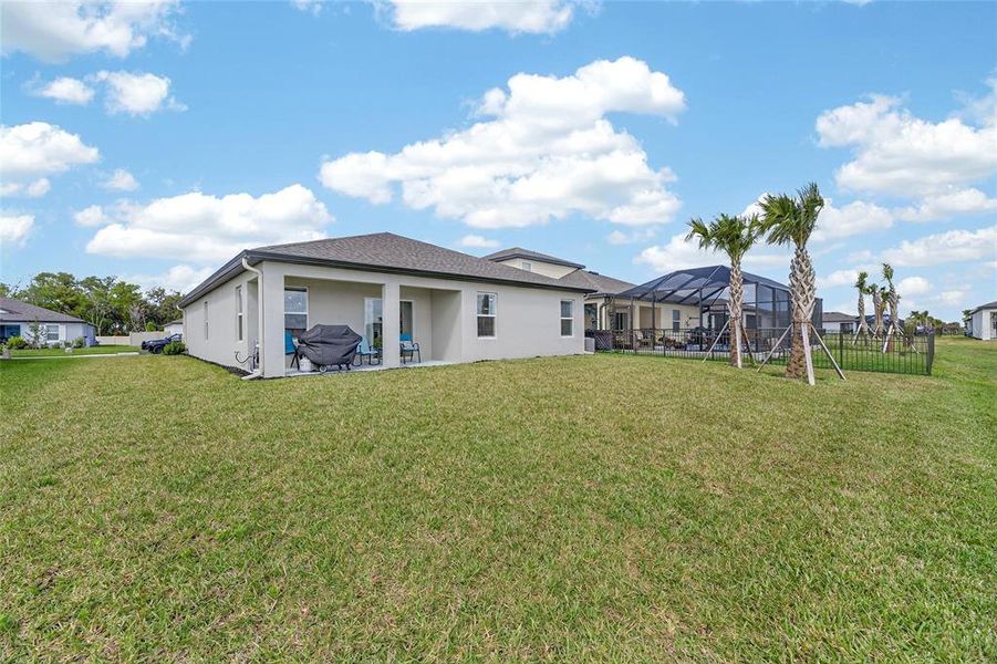 Exterior details and patio area of a home in Summerwoods, Parrish (Image 31).