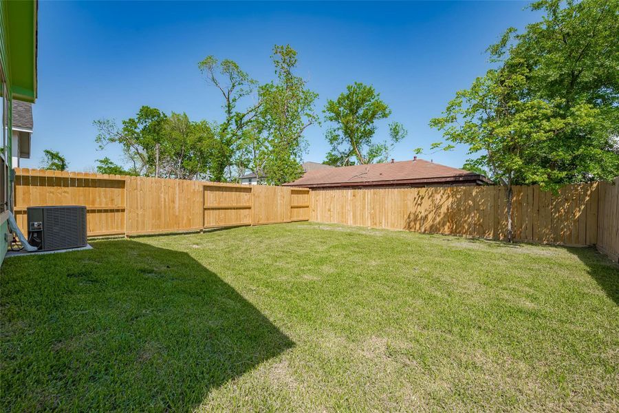 Exterior details and patio area of a home in , Houston (Image 4).