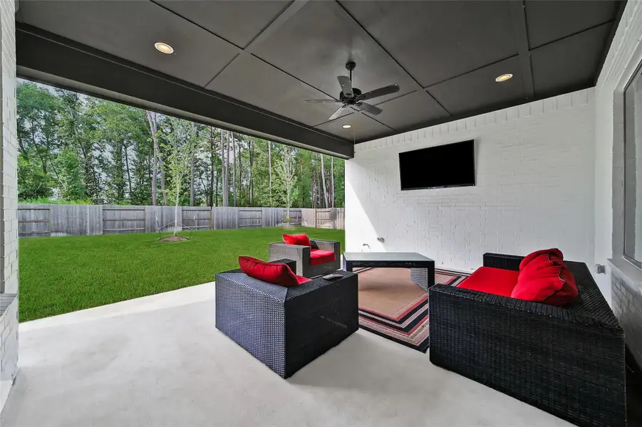 Exterior details and patio area of a home in ARTAVIA, Conroe (Image 4).