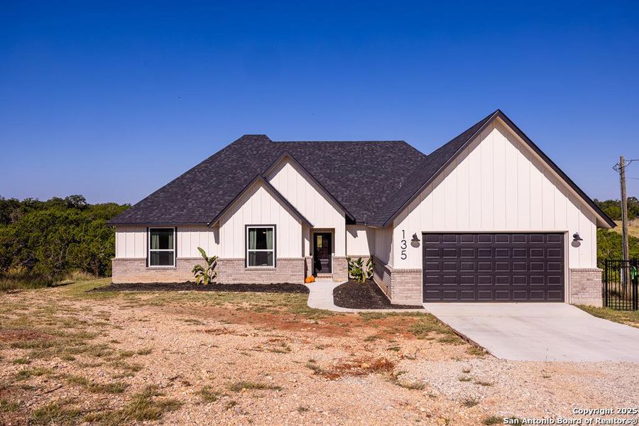 Front exterior of a new home in , Kerrville, TX, highlighting curb appeal (Image 1). Front exterior of a new home in , Kerrville, TX, highlighting curb appeal (Image 1).