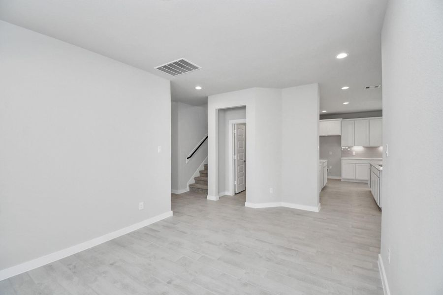 Make memories gathered around the table with your family and friends! This spacious dining room features elegant flooring, custom paint, and adjacent to family room and kitchen for open concept feel. Make memories gathered around the table with your family and friends! This spacious dining room features elegant flooring, custom paint, and adjacent to family room and kitchen for open concept feel.