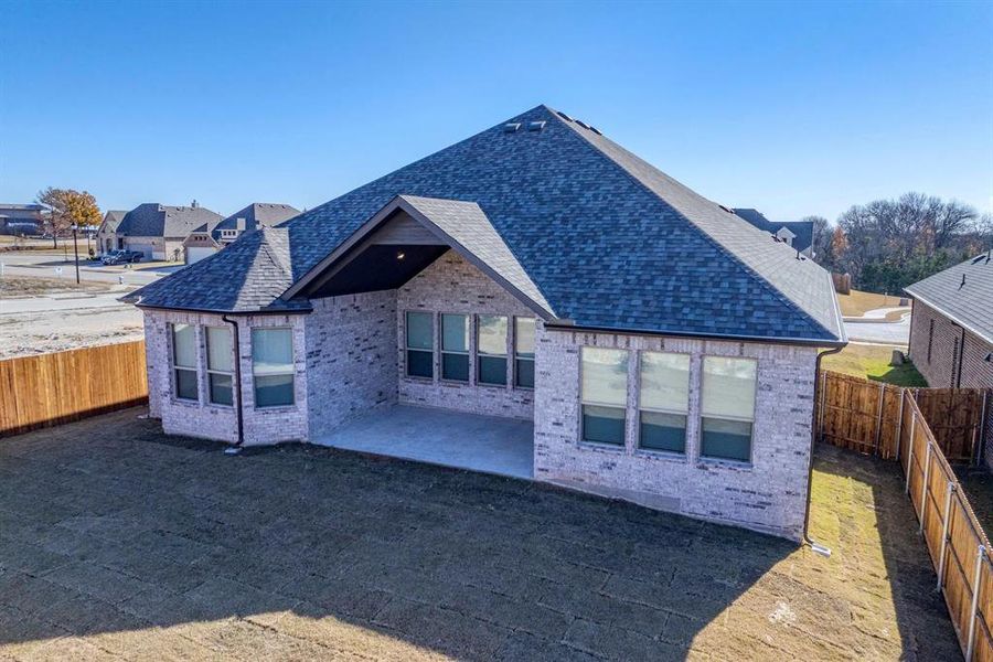 Exterior details and patio area of a home in Estates At Baker Park, Sherman (Image 21).