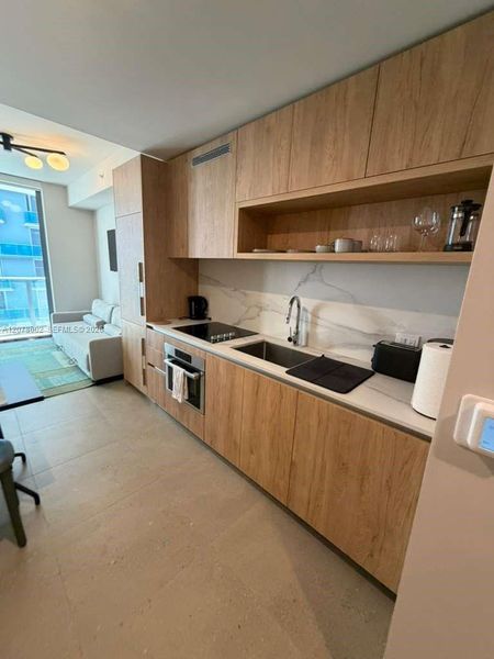 Furnished interior view inside a new home in , Miami (Image 7).
