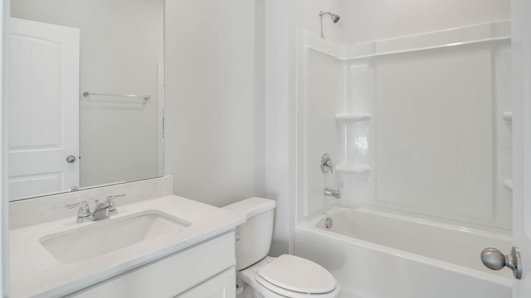 Furnished interior view inside a new home in The Parks, White House (Image 11).