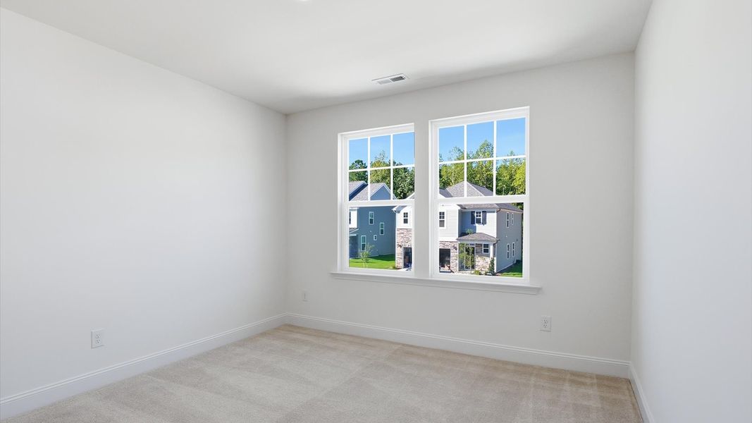 Furnished interior view inside a new home in Sidney Creek Single Family, Zebulon (Image 9).