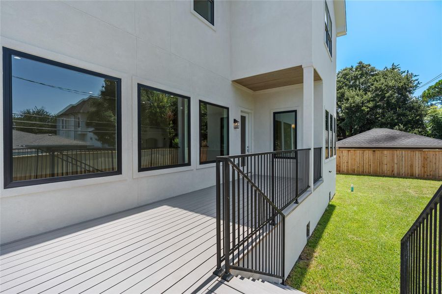 Back patio ideal for outdoor dining, entertaining, or enjoying your morning coffee.