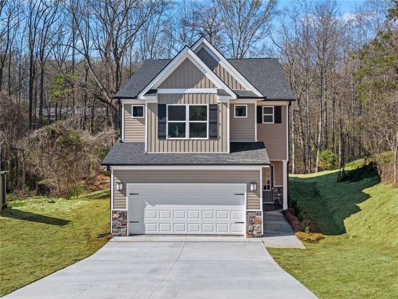 Front exterior of a new home in , Alto, GA, highlighting curb appeal (Image 17).