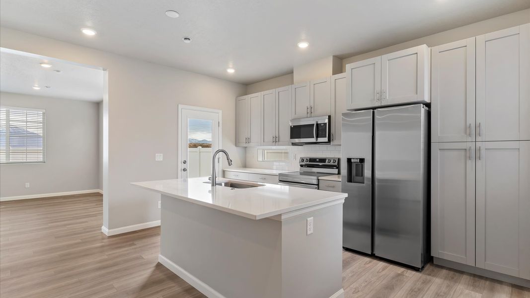 Furnished interior view inside a new home in Reunion, Commerce City (Image 10).