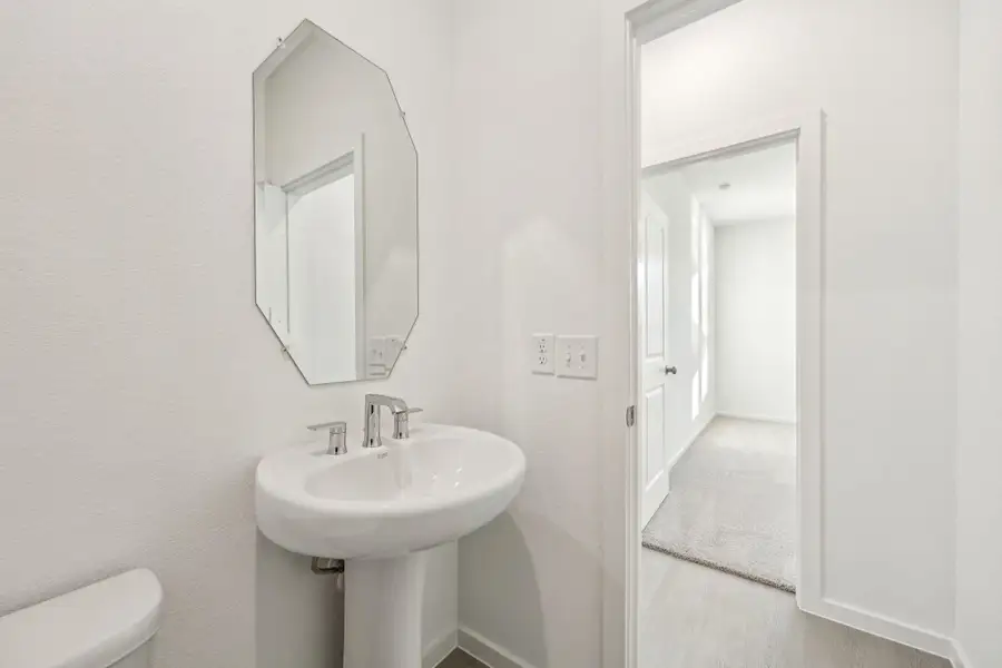 Furnished interior view inside a new home in Decker Farms, Magnolia (Image 6).