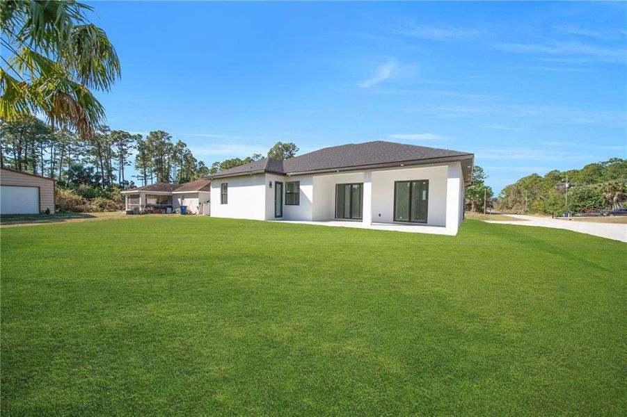 Exterior details and patio area of a home in , Lehigh Acres (Image 19). Exterior details and patio area of a home in , Lehigh Acres (Image 19).
