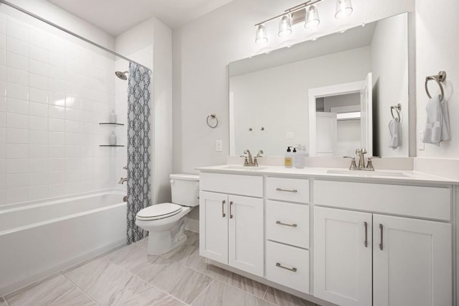 Furnished interior view inside a new home in Mosaic, Prosper (Image 24).