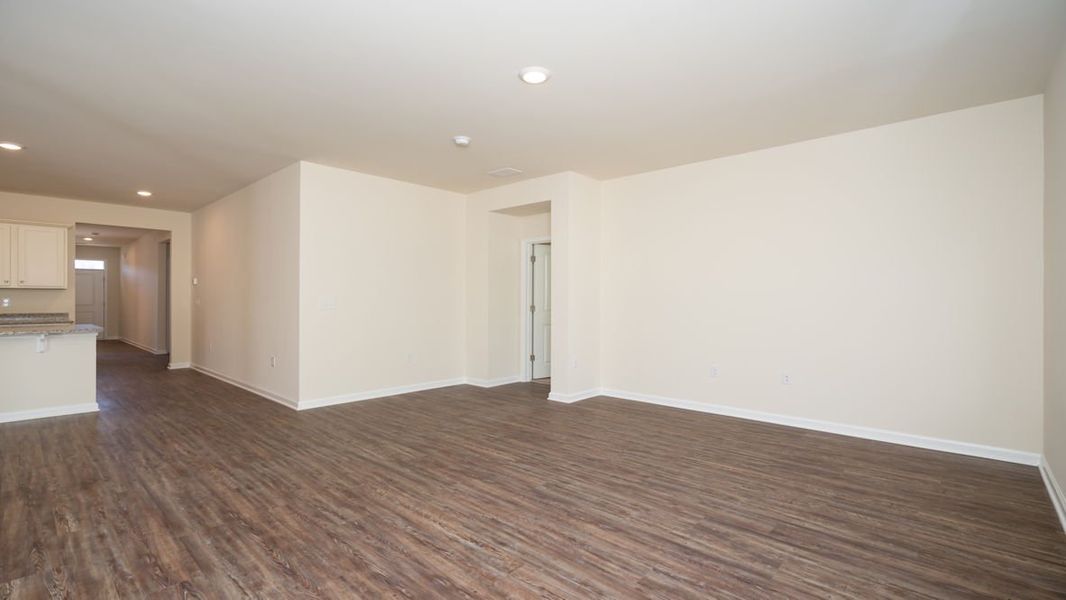 Representative unfurnished interior of a home built from the CALI by D.R. Horton in The Reserve at Wild Horse, Conway (Image 26).