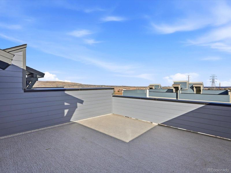 Exterior details and patio area of a home in Three Hills, Morrison (Image 4). Exterior details and patio area of a home in Three Hills, Morrison (Image 4).