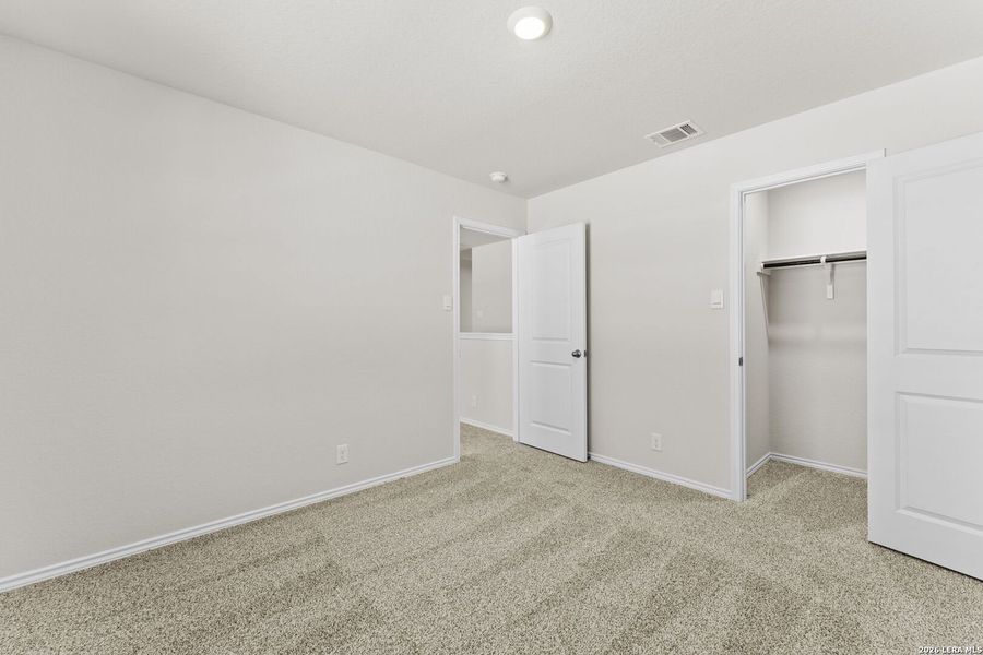 Spacious, unfurnished interior of a new home in Hunters Ranch, San Antonio (Image 12).