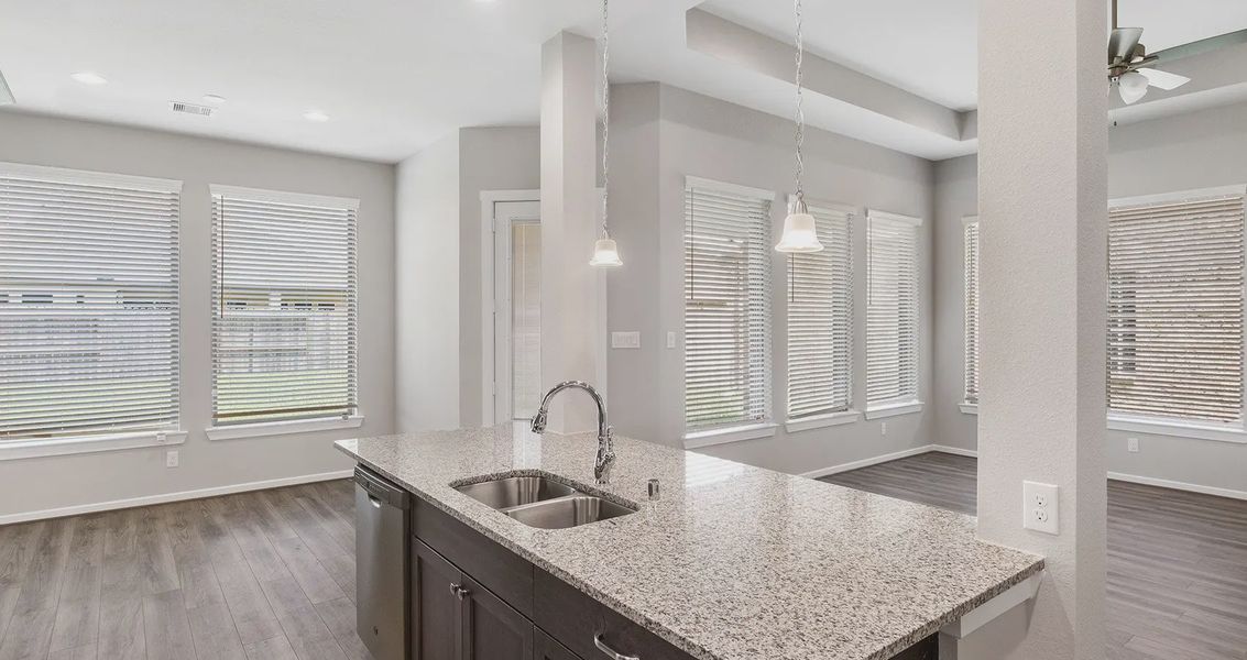Representative furnished interior of a home built from the Pendleton by Chesmar Homes in The Woodlands Hills, Willis (Image 6).