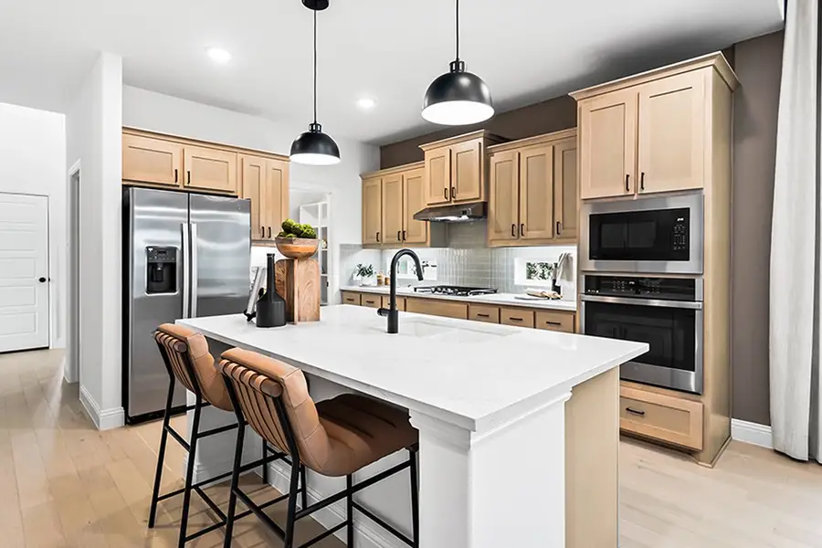 Furnished interior view inside a new home in Leonard Trails, Anna (Image 13).