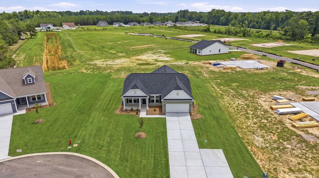 Front exterior of a new home in Oak Grove, Conway, SC, highlighting curb appeal (Image 16).