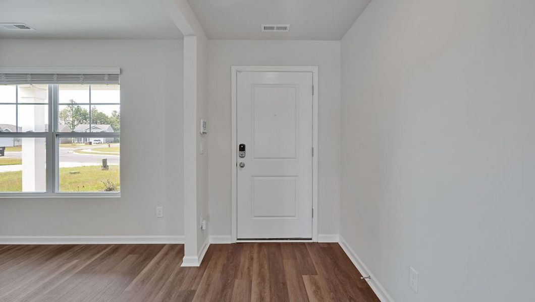 Representative unfurnished interior of a home built from the Hayden by D.R. Horton in Cedar Hill Landing, Navassa (Image 18).