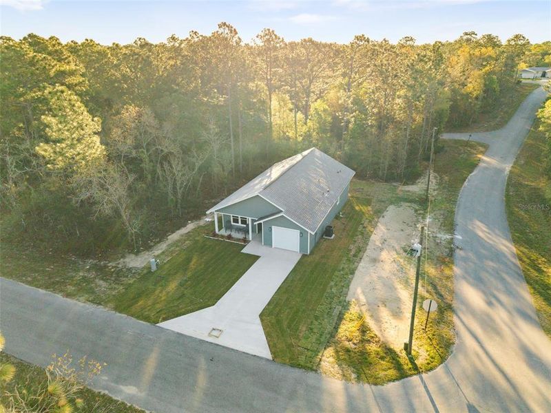 Front exterior of a new home in , Williston, FL, highlighting curb appeal (Image 18).