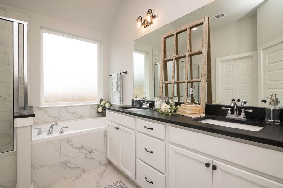 Representative furnished interior of a home built from the The Laurel by Avonley Homes in Greens Prairie Reserve, College Station (Image 15).