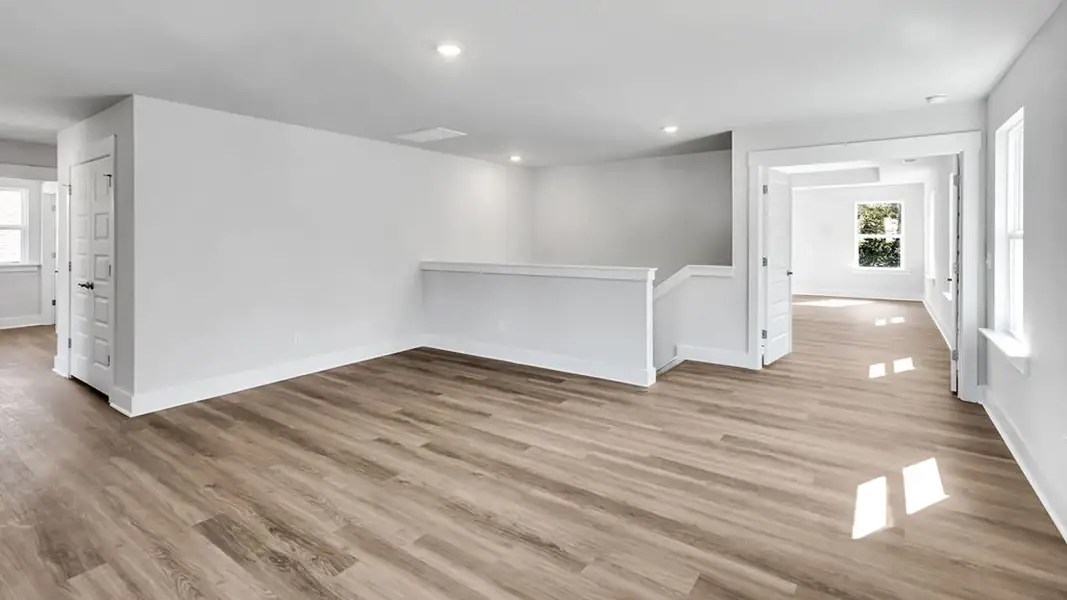 Spacious, unfurnished interior of a new home in Magnolia Ridge at Blake Farm, Wilmington (Image 27). Spacious, unfurnished interior of a new home in Magnolia Ridge at Blake Farm, Wilmington (Image 27).