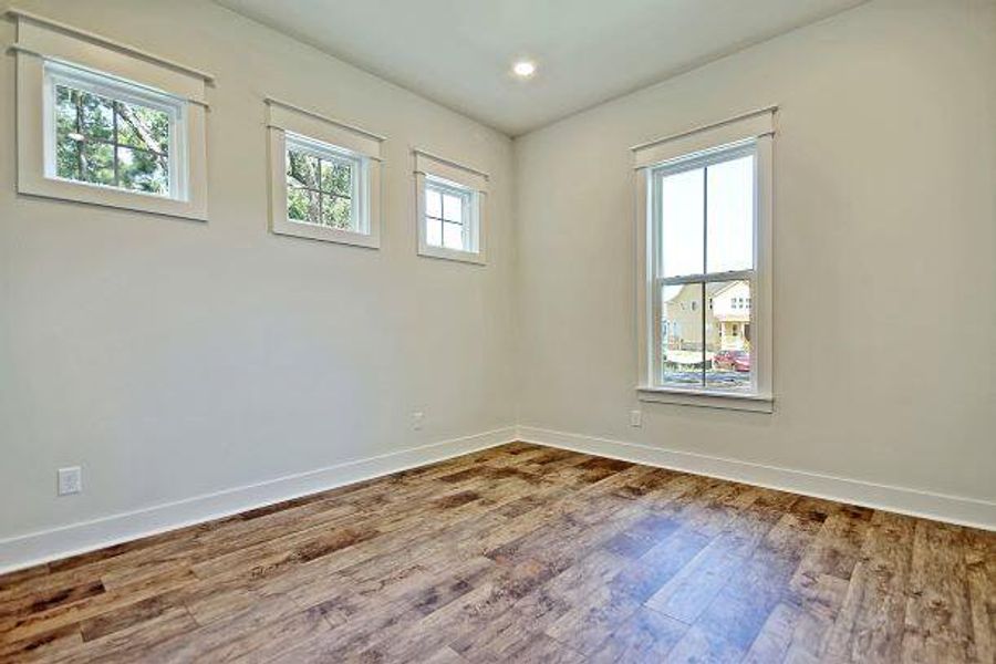 Spacious, unfurnished interior of a new home in Heron's Walk at Summers Corner: Row Collection, Summerville (Image 11).