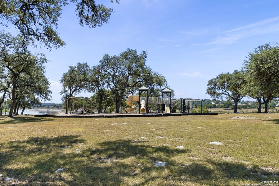 Front exterior of a new home in , Spring Branch, TX, highlighting curb appeal (Image 1).