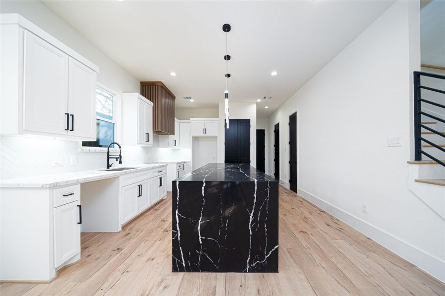 Enjoy a welcoming view from the breakfast area into the spacious living room, creating an inviting setting for everyday moments. Featuring new appliances, ideal lighting, and a beautifully designed gathering space, this home is perfect for comfortable living and entertaining. Enjoy a welcoming view from the breakfast area into the spacious living room, creating an inviting setting for everyday moments. Featuring new appliances, ideal lighting, and a beautifully designed gathering space, this home is perfect for comfortable living and entertaining.