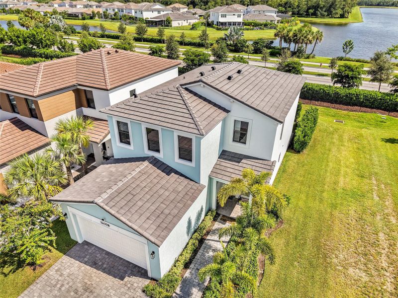 Front exterior of a new home in , Loxahatchee, FL, highlighting curb appeal (Image 22).
