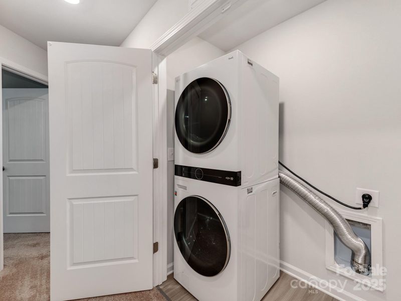 Furnished interior view inside a new home in McKee Creek Village, Charlotte (Image 9). Furnished interior view inside a new home in McKee Creek Village, Charlotte (Image 9).
