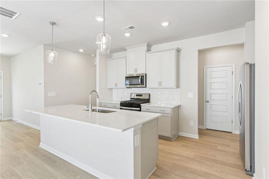 Furnished interior view inside a new home in , Cumming (Image 8). Furnished interior view inside a new home in , Cumming (Image 8).